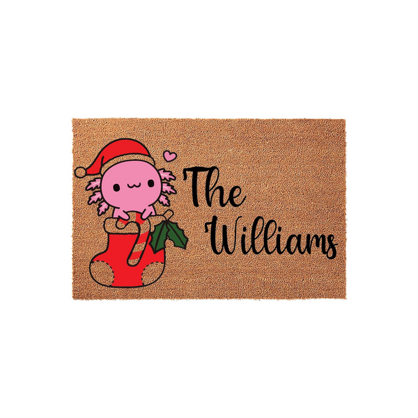 Personalized Axolotl Christmas Doormat featuring a cute pink axolotl wearing a Santa hat while sitting in a red stocking, with custom family name text printed in black script on a natural coir fiber background for holiday decor.