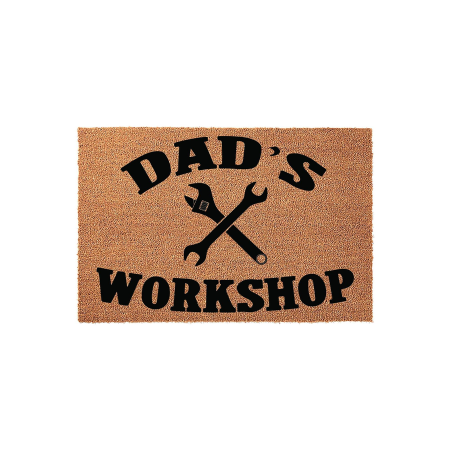 Dad's Workshop coir doormat featuring a rustic natural fiber texture with bold black text and a crossed wrench graphic, making it a fun and practical addition to any garage, shed, or home workshop entrance for a handy father.