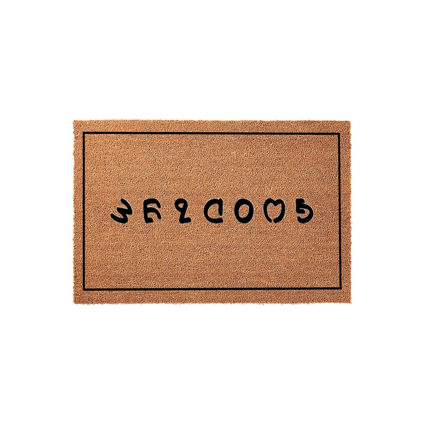 Goodbye doormat with a natural coir texture and a simple black border, featuring the word Goodbye printed in a playful, rounded black font centered on the mat to add a humorous touch to your front porch entryway decor.