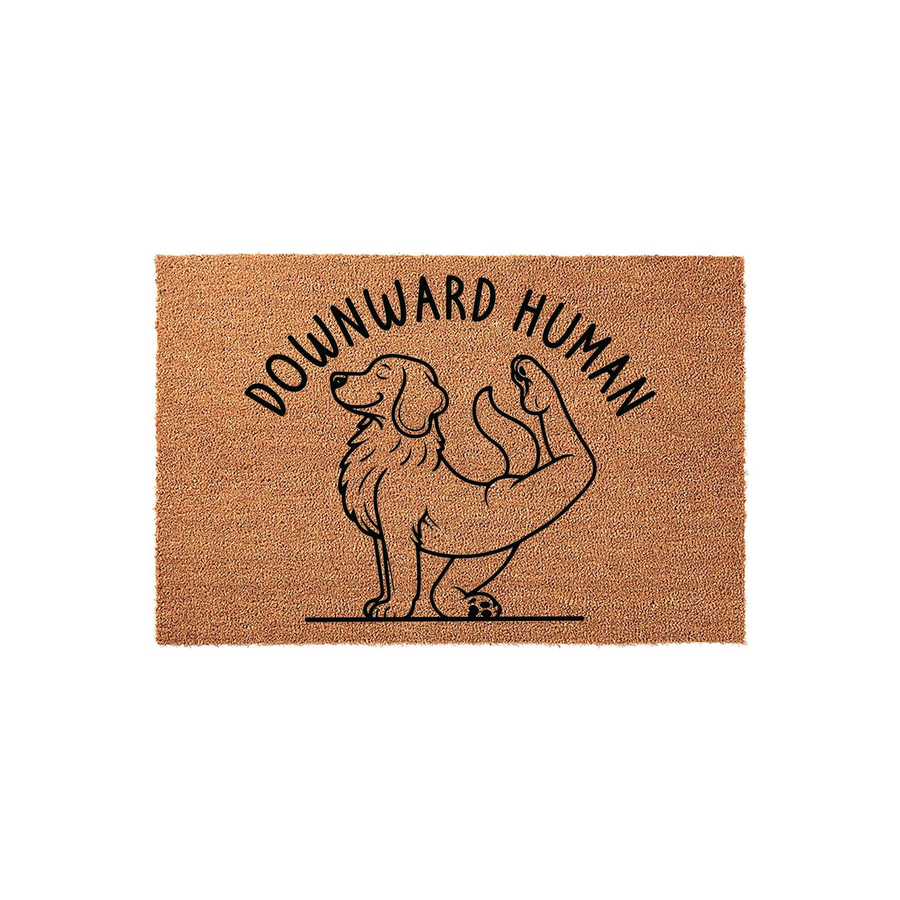 Golden Retriever Yoga Doormat featuring a cute dog in a downward dog pose with the text Downward Human printed in black ink on a natural tan coir fiber mat, creating a fun and humorous entryway decor piece for any dog lover home.