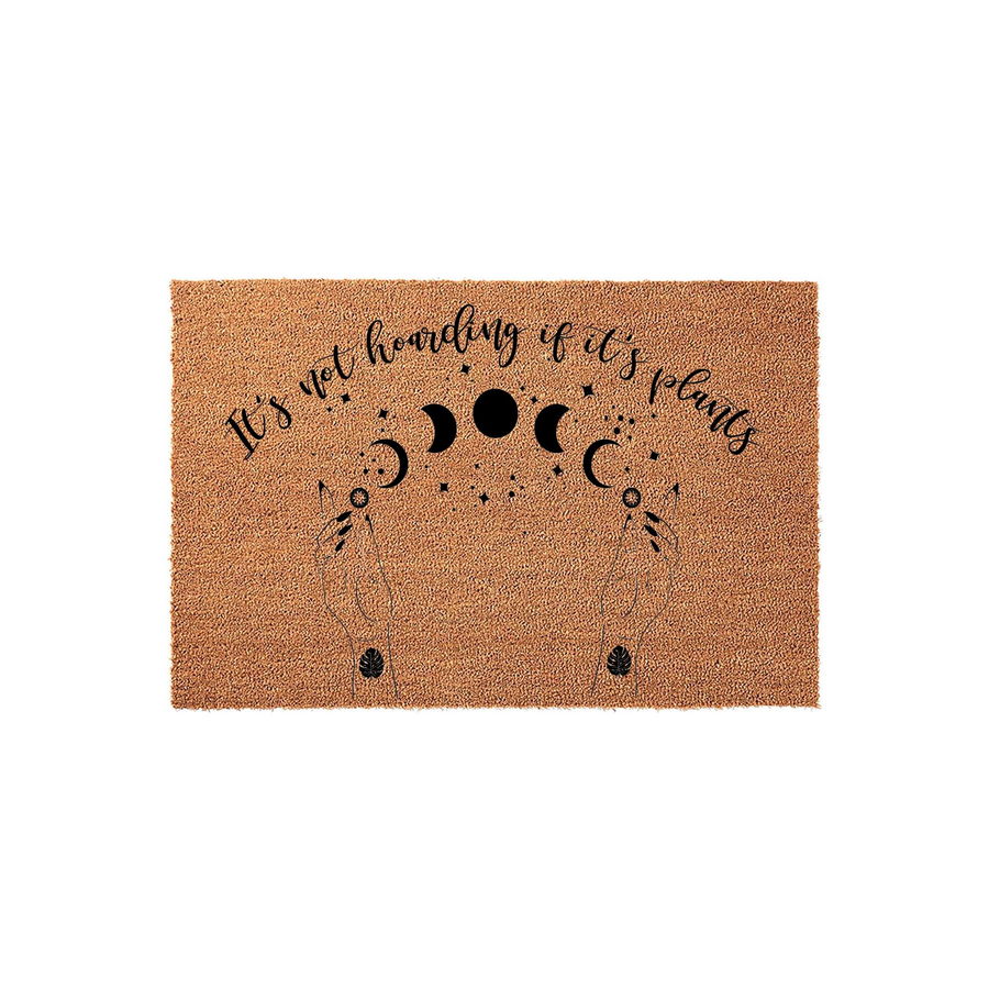It's Not Hoarding If It's Plants coir doormat featuring a celestial moon phase design and two hands holding stars, printed in black ink on a natural brown textured fiber surface for a fun and decorative entryway floor mat.