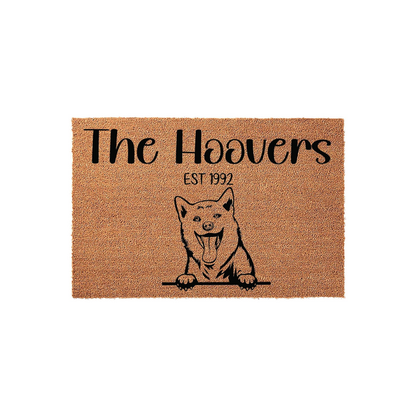 Personalized Shiba Inu doormat featuring a cute dog illustration and custom family name text, crafted from durable natural coir fibers to create a welcoming entrance for any dog lover home on a clean white studio background.