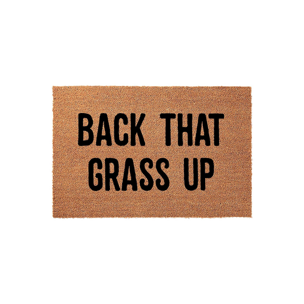 Funny Back That Grass Up doormat featuring bold black text printed on a natural tan coir fiber mat, providing a humorous and welcoming touch to your front porch decor with its durable, textured surface and classic rectangular