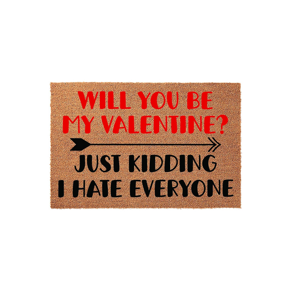 Funny Valentine's Day coir doormat featuring the text Will You Be My Valentine? in red, followed by a black arrow and the humorous phrase Just Kidding I Hate Everyone in bold black lettering against a natural brown fiber