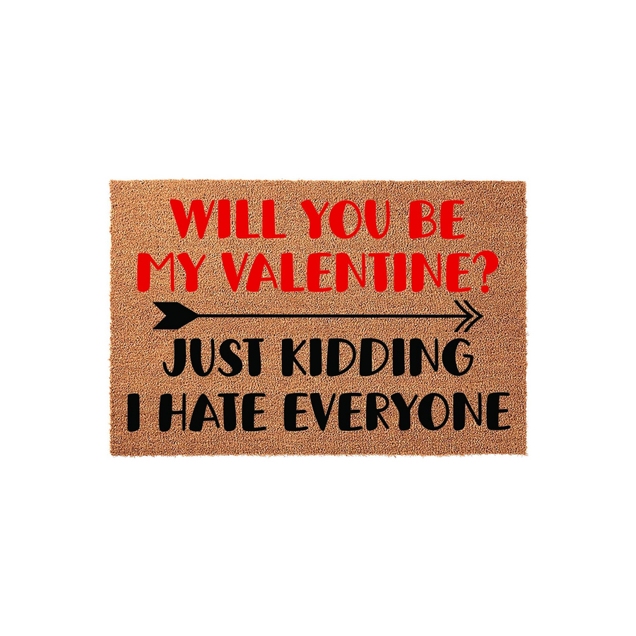 Funny Valentine's Day coir doormat featuring the text Will You Be My Valentine? in red, followed by a black arrow and the humorous phrase Just Kidding I Hate Everyone in bold black lettering against a natural brown fiber