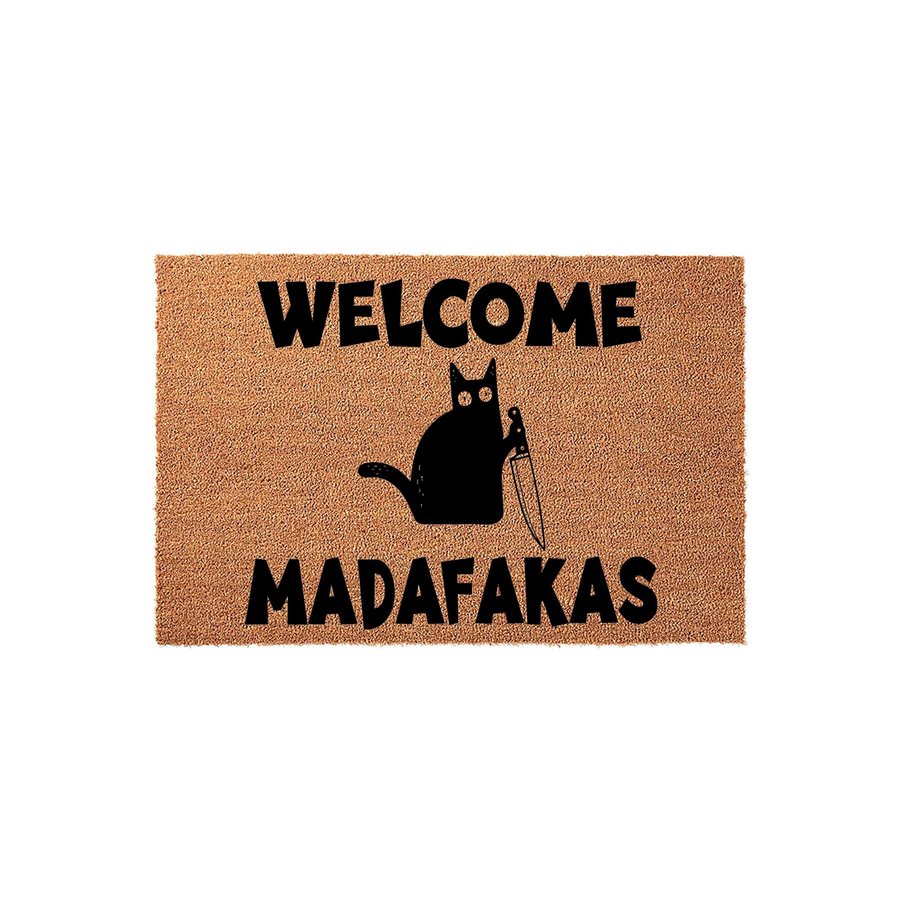 Funny cat welcome doormat featuring a black cat holding a knife, printed on a natural coir fiber mat with bold black text that reads Welcome Madafakas, perfect for a humorous entryway decor statement on a plain white background.