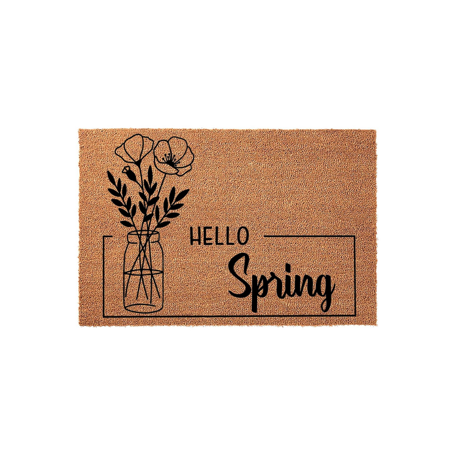 Hello Spring floral doormat featuring a natural coir texture with a black ink design of wildflowers in a mason jar, creating a welcoming seasonal entryway accent for your front porch decor that celebrates the arrival of the