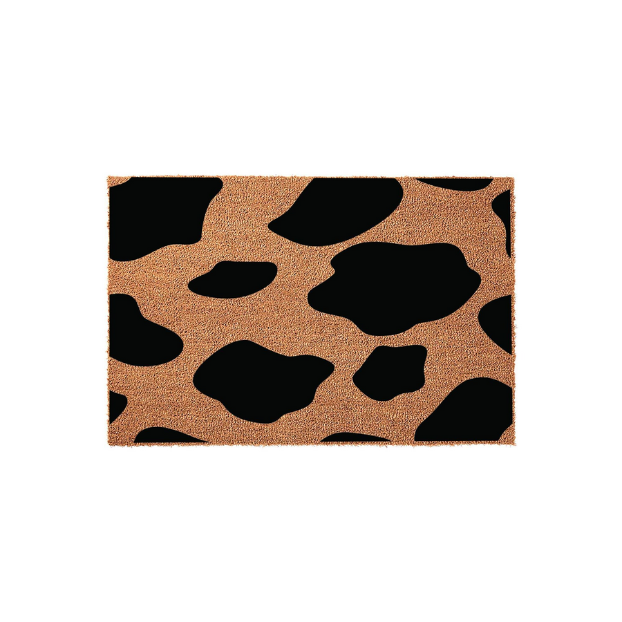 Cow Print Coir Doormat featuring a classic black and brown animal hide pattern on a natural fiber texture, providing a rustic and farmhouse style entrance rug for your front porch or home entryway on a clean white background.