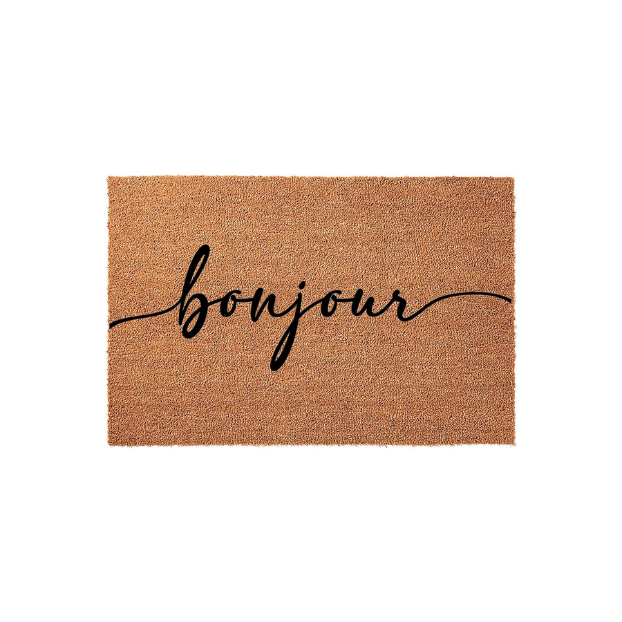 Bonjour coir doormat featuring a natural tan fiber texture and elegant black cursive script lettering centered on the mat, providing a welcoming and stylish entrance decor piece for your front porch or home entryway floor.