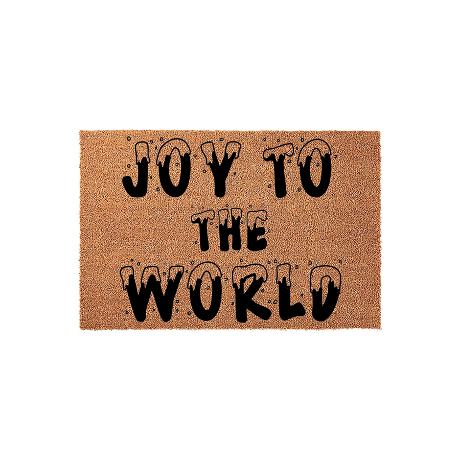 Joy to the World Christmas doormat featuring a natural coir texture with bold black lettering that has a festive melting snow effect, creating a cheerful holiday welcome for your front porch entrance during the winter season.