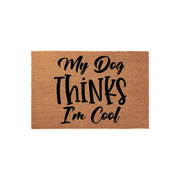 My Dog Thinks I am Cool coir doormat featuring bold black typography on a natural brown fiber background, making this funny pet-themed welcome mat a charming addition to any dog lover's front porch or entryway decor for the home.