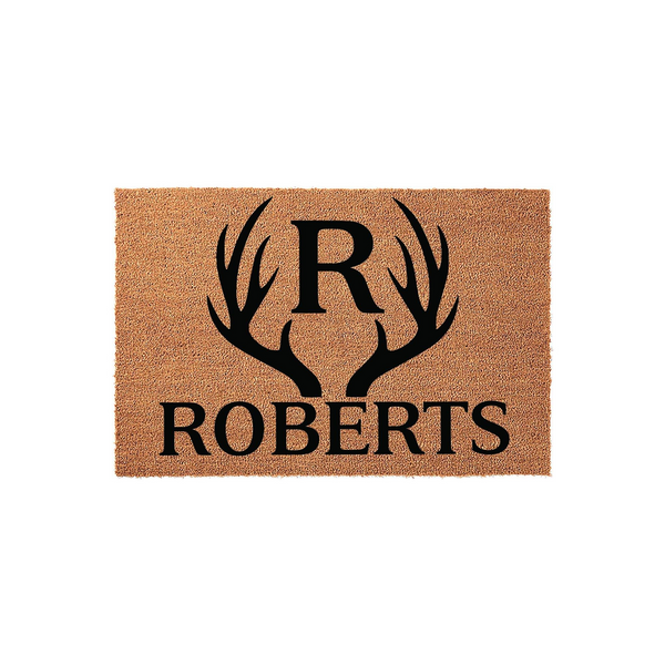 Personalized Antler Monogram Coir Doormat featuring a large black letter R centered between two rustic deer antlers, with a family name printed in bold black lettering on a natural tan textured coir background for a farmhouse