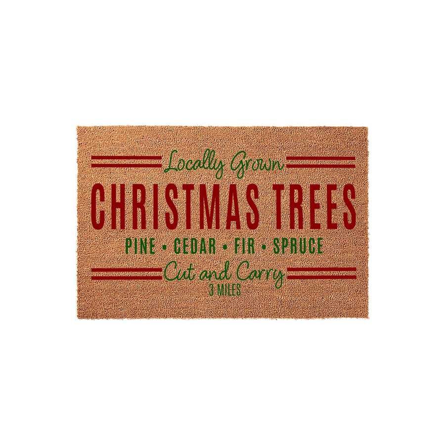 Locally Grown Christmas Trees coir doormat featuring festive red and green typography on a natural tan fiber background, perfect for holiday porch decor with its charming rustic design listing pine, cedar, fir, and spruce tree