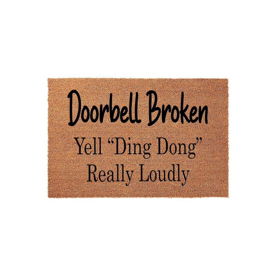 Funny Doorbell Broken doormat made of natural coir fiber with black text that reads, Doorbell Broken, Yell Ding Dong Really Loudly, providing a humorous welcome for guests at your front door entrance on a plain white background.