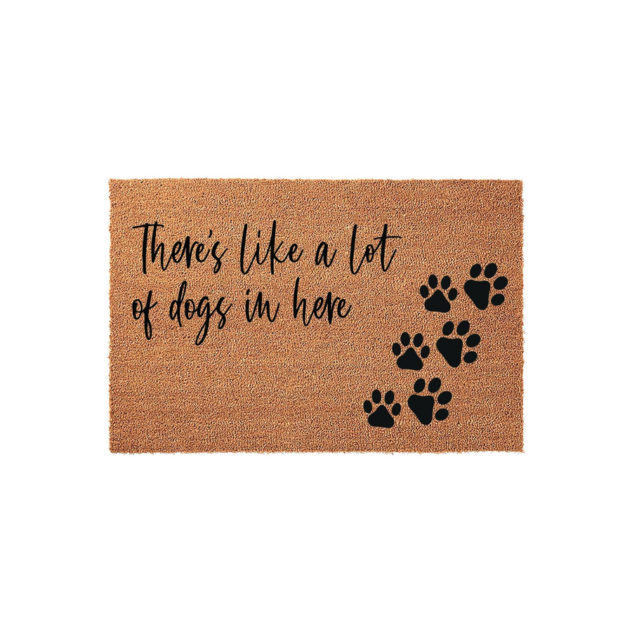 Funny Dog Lover Coir Doormat featuring the text There is like a lot of dogs in here written in black script, accompanied by several black paw prints on a natural brown textured coir background for a charming front porch entryway.