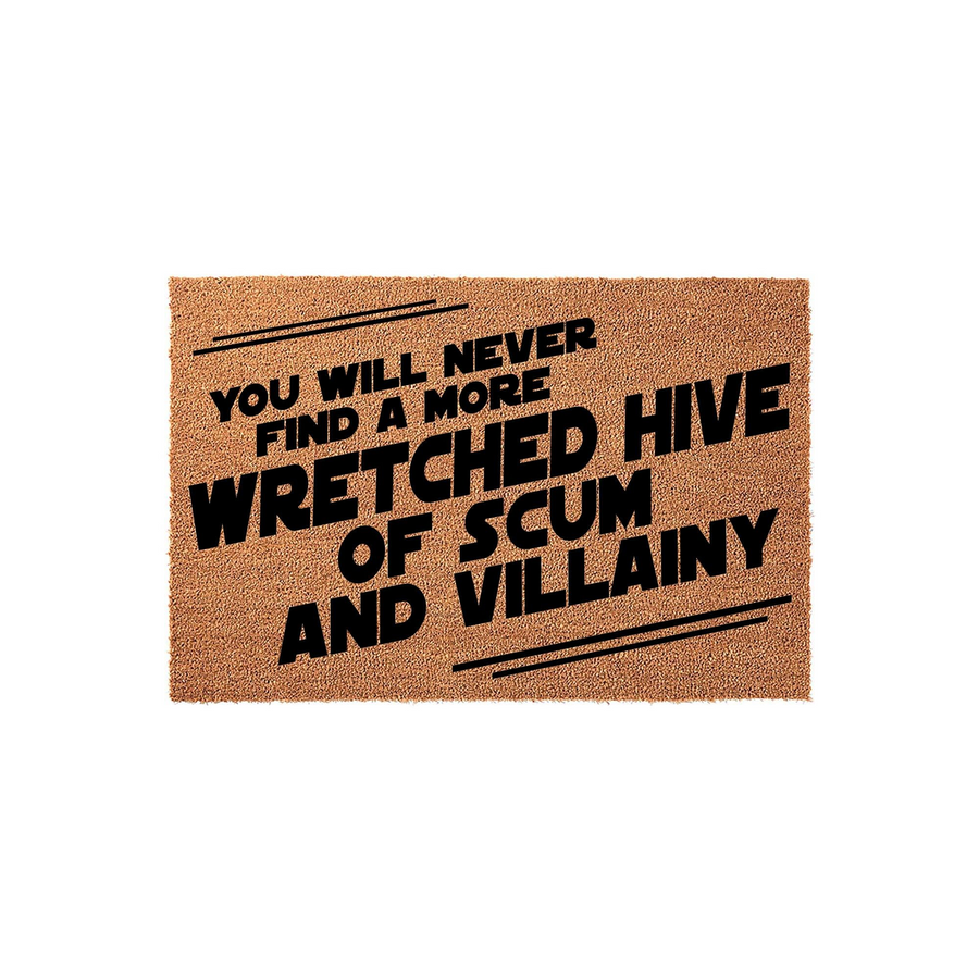 Sci-fi themed coir doormat featuring the quote You Will Never Find A More Wretched Hive Of Scum And Villainy in bold black lettering, set against a natural tan fiber background for a fun and geeky home entryway decor statement.