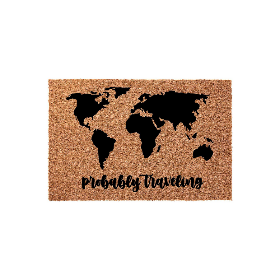 World Map Probably Traveling Doormat featuring a natural coir texture with a bold black silhouette of the world map and the playful script text probably traveling printed in the center against a clean white studio background.