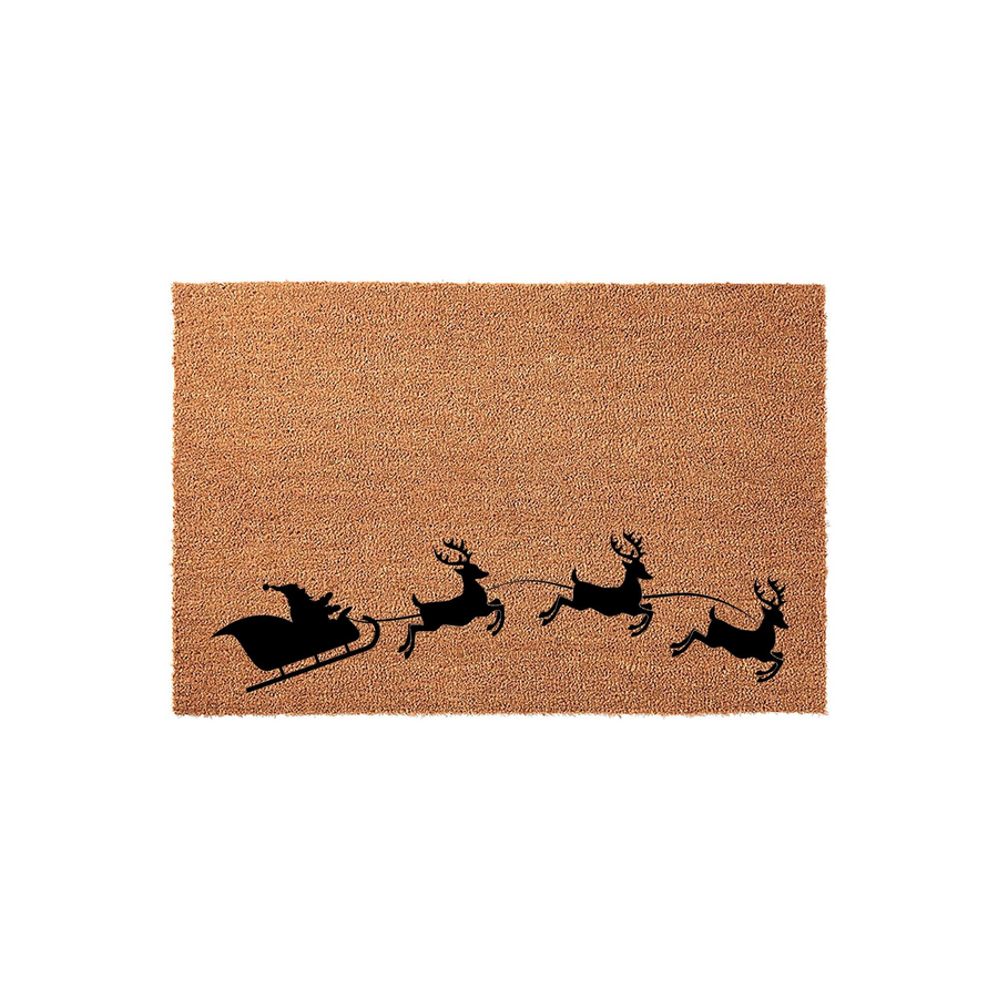 Santa Claus Sleigh Christmas Doormat featuring a natural coir texture with a black silhouette design of Santa in his flying sleigh pulled by three reindeer, creating a festive holiday entrance for your home front porch decor.