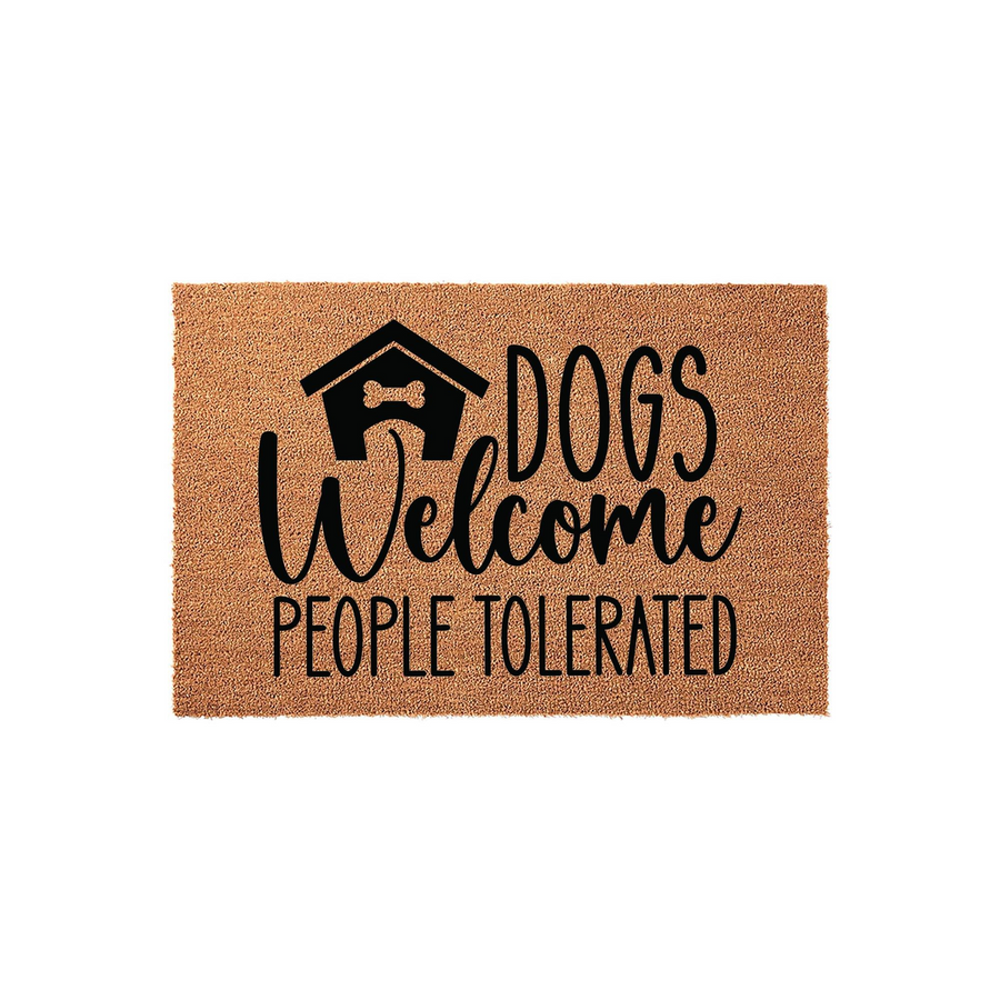Dogs Welcome People Tolerated coir doormat featuring a black dog house icon and bold typography on a natural brown fiber background, creating a humorous and welcoming entrance mat for any dog lover's home front porch or entryway.