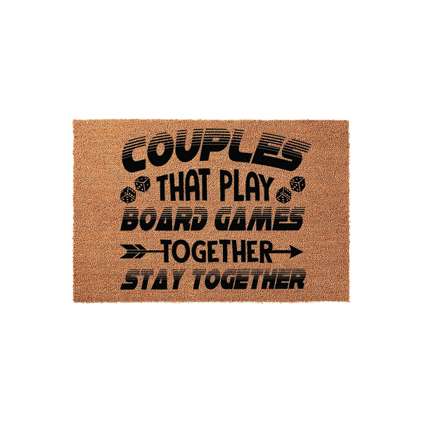 Couples That Play Board Games Together Stay Together coir doormat featuring black text and dice graphics on a natural brown fiber background, perfect for a fun entryway or a housewarming gift for gaming enthusiasts who love board