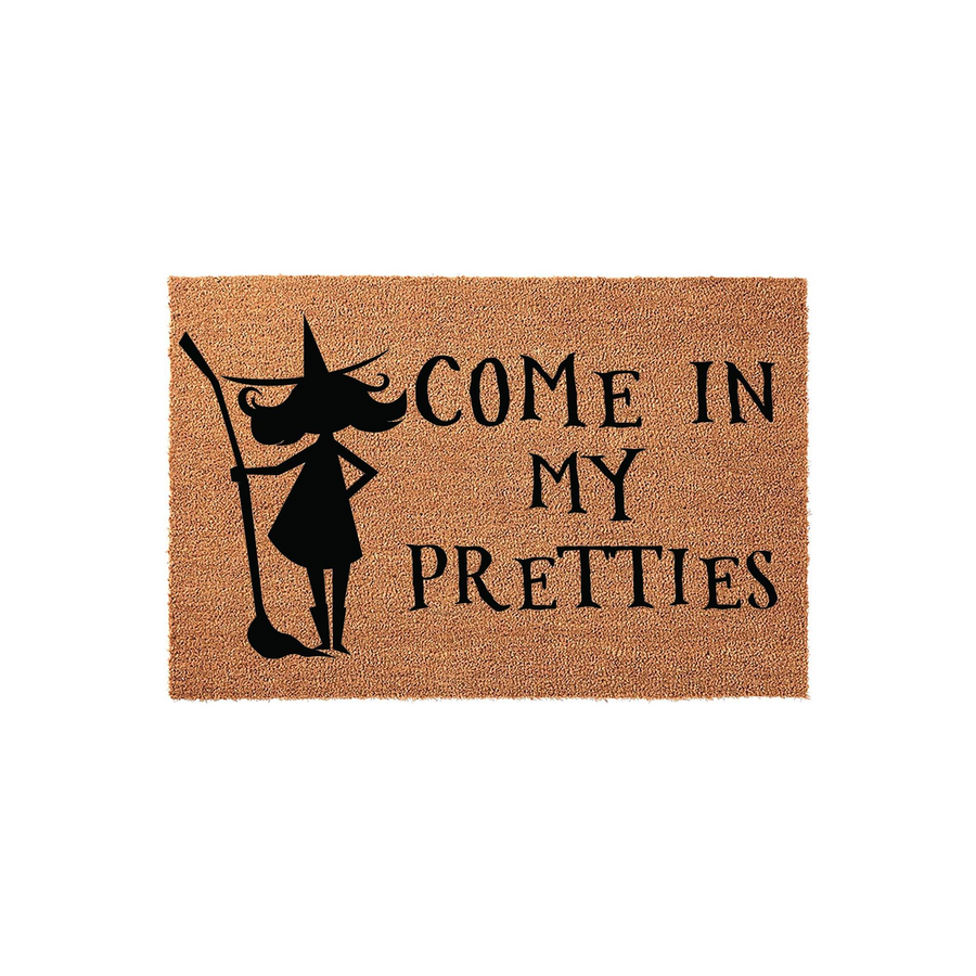 Halloween Witch Come In My Pretties Doormat featuring a natural coir texture with a black silhouette of a witch holding a broomstick, perfect for adding a spooky and fun seasonal touch to your front porch entryway decor this