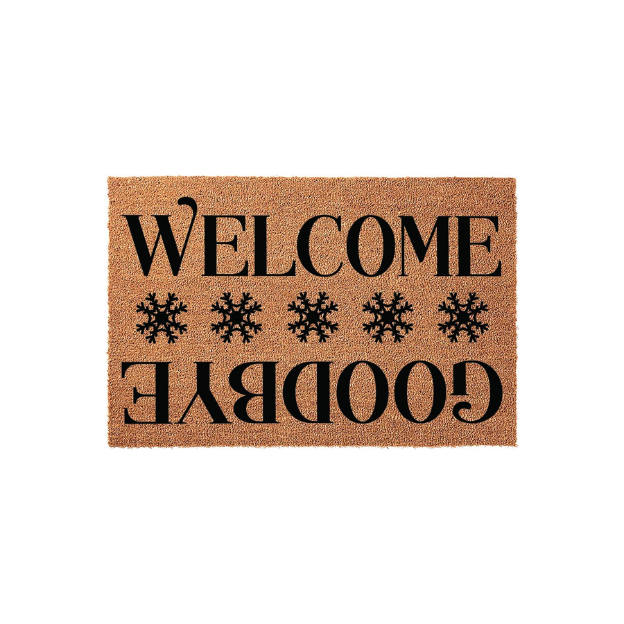 Winter Welcome Goodbye Doormat featuring a natural coir fiber texture with black printed text that reads Welcome at the top and Goodbye upside down at the bottom, separated by a row of five decorative black snowflakes on a plain