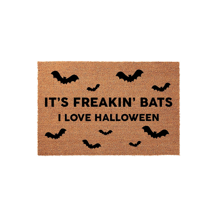 It's Freakin' Bats I Love Halloween doormat featuring a natural coir fiber texture with black printed text and scattered bat silhouettes, creating a festive and spooky entryway decor piece for the autumn holiday season.