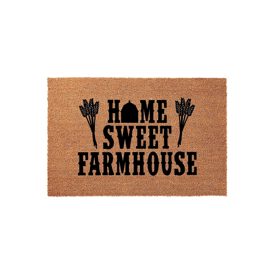 Home Sweet Farmhouse coir doormat featuring a rustic brown natural fiber texture with black printed text and wheat stalk illustrations, creating a welcoming entryway decor piece for a modern farmhouse style front porch or home