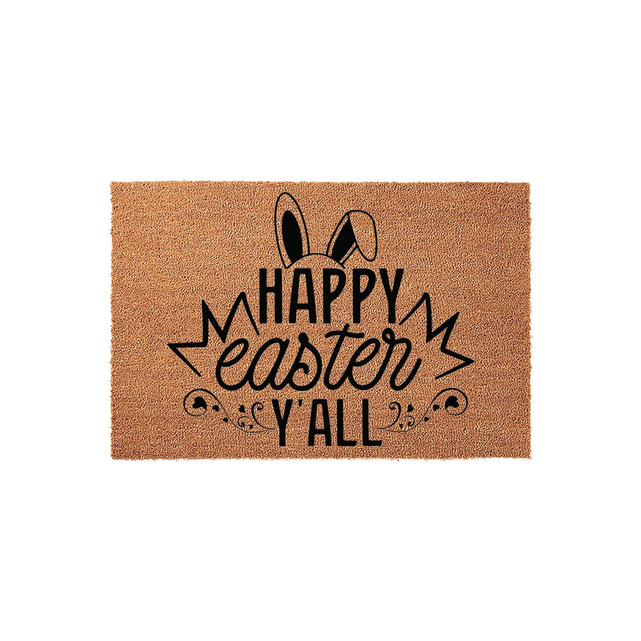 Happy Easter Y'all coir doormat featuring a festive bunny ear design in black ink on a natural tan fiber background, creating a welcoming spring porch decor piece for your front entryway during the holiday season.