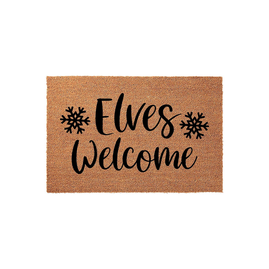 Elves Welcome Christmas doormat featuring a natural coir texture with black script lettering and snowflake accents, creating a festive holiday entryway decor piece for your front porch during the winter season.