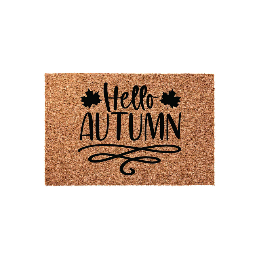 Hello Autumn coir doormat featuring black printed text and maple leaf accents on a natural brown fiber background, providing a festive seasonal welcome for your front porch entryway during the fall months of the year.