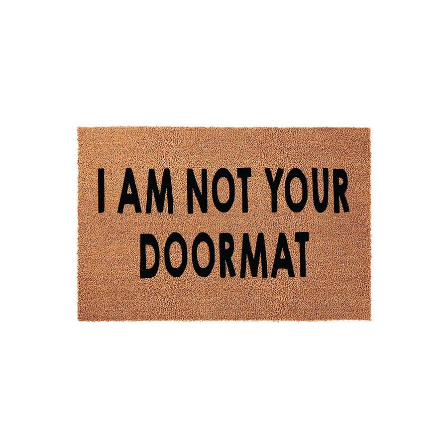 Funny I Am Not Your Doormat coir welcome mat featuring bold black text printed on a natural brown coconut fiber surface, providing a humorous and sarcastic greeting for your front porch entrance on a clean white studio background.
