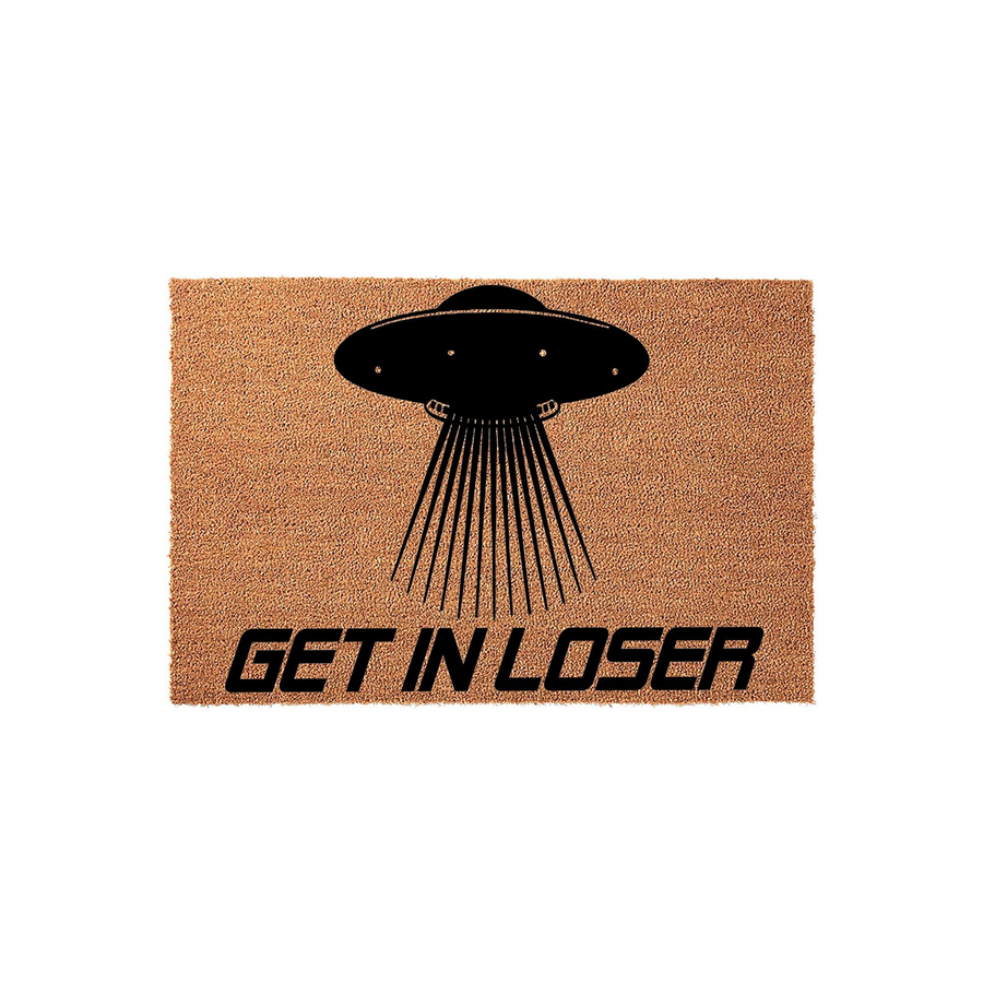 Get In Loser UFO doormat featuring a black graphic of a flying saucer beaming down light rays onto a natural brown coir fiber mat, creating a funny and unique sci-fi themed entrance decor piece for any space-loving home or