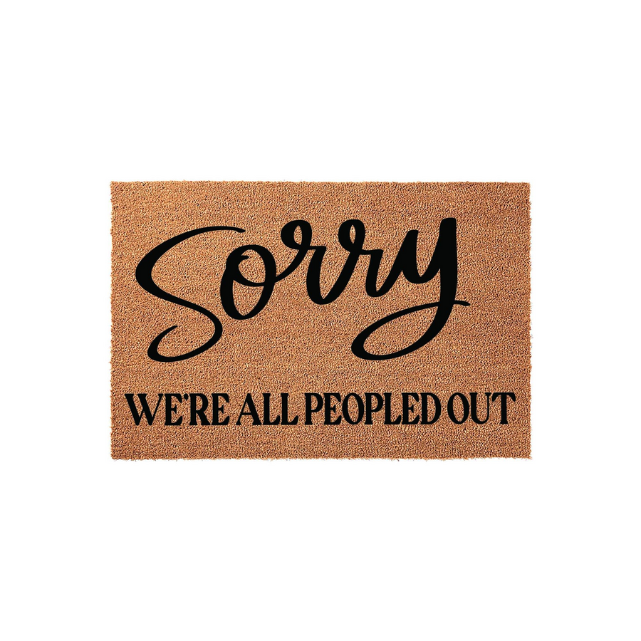 Sorry We Are All Peopled Out funny coir doormat featuring bold black text on a natural brown fiber background, designed to add a humorous and welcoming touch to your front porch entryway decor for guests and visitors.