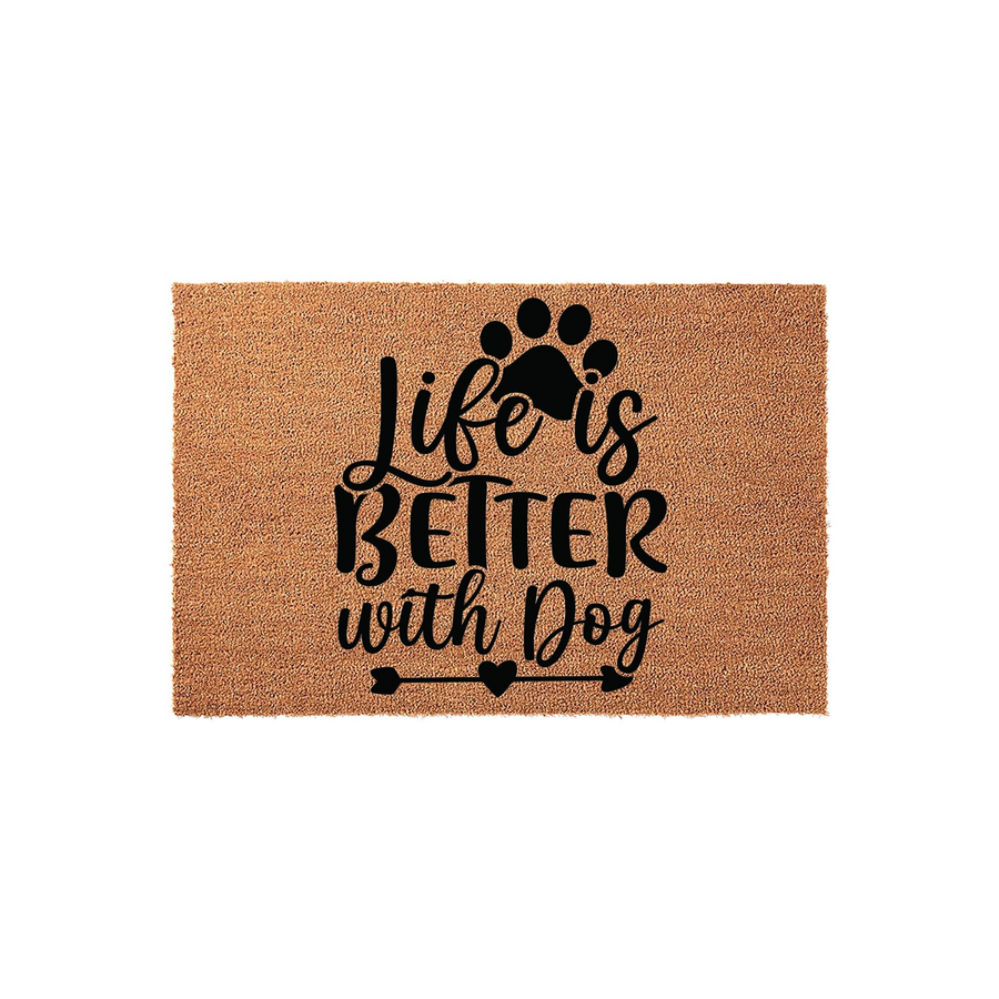 Life is Better with Dog coir doormat featuring a natural tan fiber texture and bold black lettering, accented by a paw print and an arrow design that makes a welcoming addition to any pet lover's front porch or entryway decor.