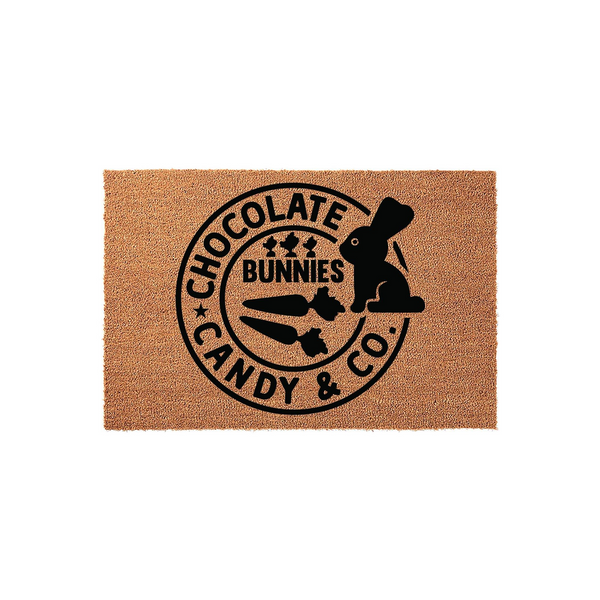Chocolate Bunnies Candy and Co. Easter doormat featuring a natural coir fiber texture with a black circular logo design that includes a silhouette of a bunny and carrots, perfect for seasonal spring home decor on a front porch