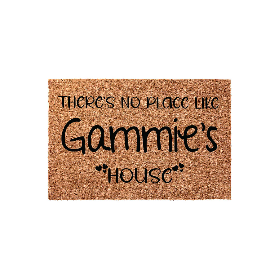 Personalized Gammie's House Coir Doormat featuring a natural tan fiber texture with black text that reads There's No Place Like Gammie's House, accented by small heart icons on a clean white background for a welcoming entryway.