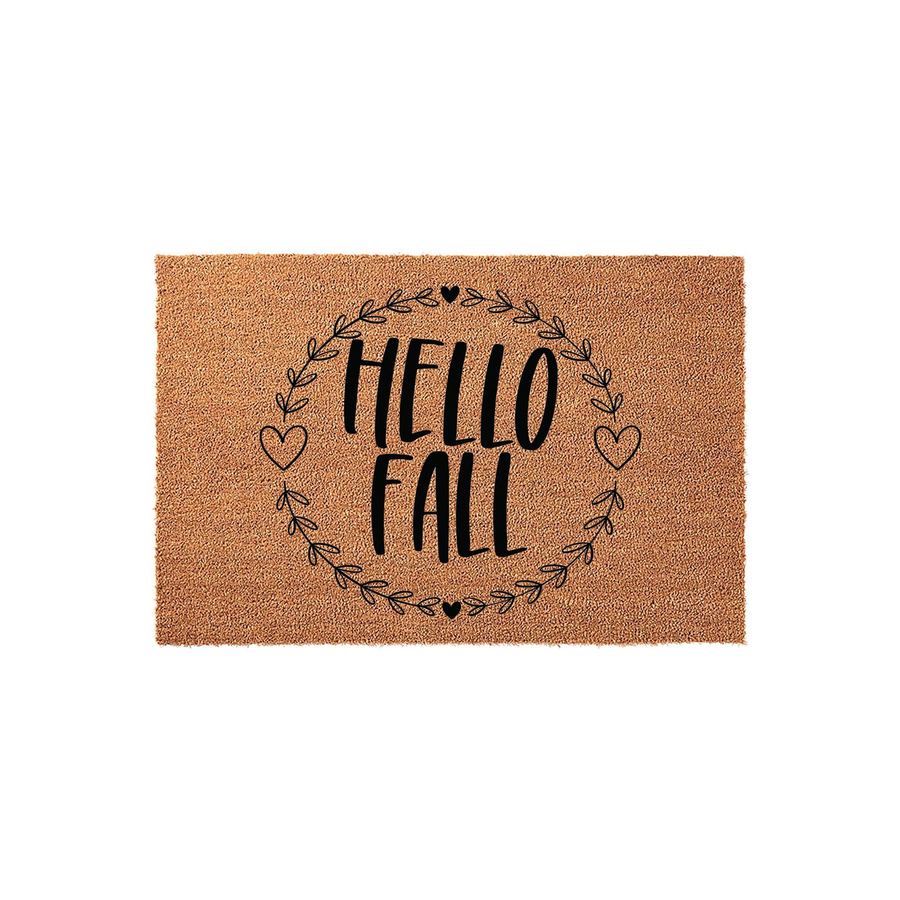 Hello Fall coir doormat featuring a rustic natural fiber texture with a black printed design of a leafy wreath, small hearts, and the seasonal greeting Hello Fall centered on a clean white background for autumn porch decor.