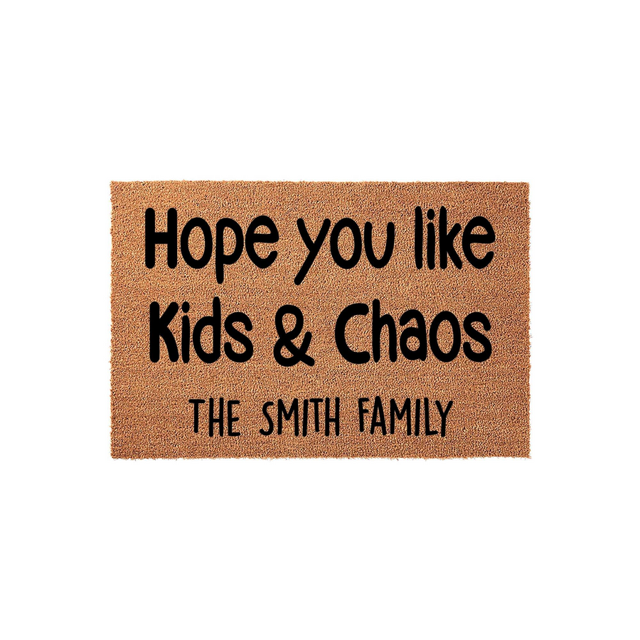 Personalized Kids and Chaos doormat featuring a natural coir texture with bold black text that reads Hope you like Kids and Chaos followed by a customizable family name line, set against a clean white studio background.