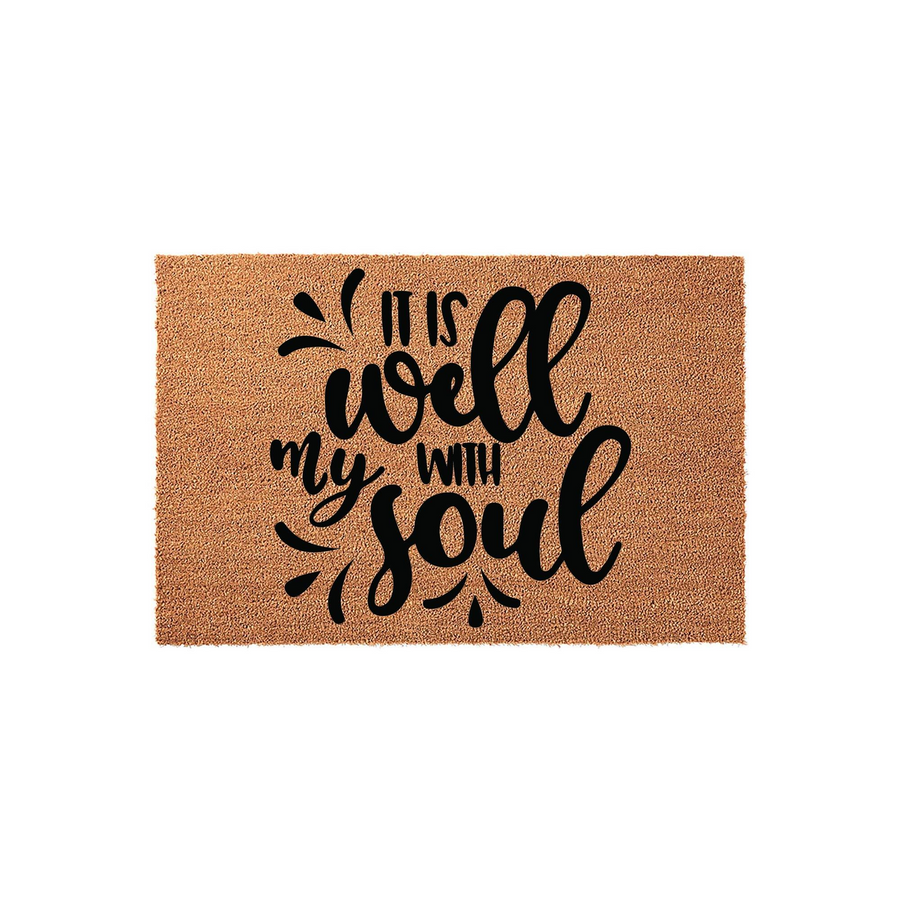It Is Well With My Soul Coir Doormat featuring a natural tan fiber texture and bold black script lettering that creates a welcoming entryway aesthetic for your home, displayed against a clean and simple white studio background.