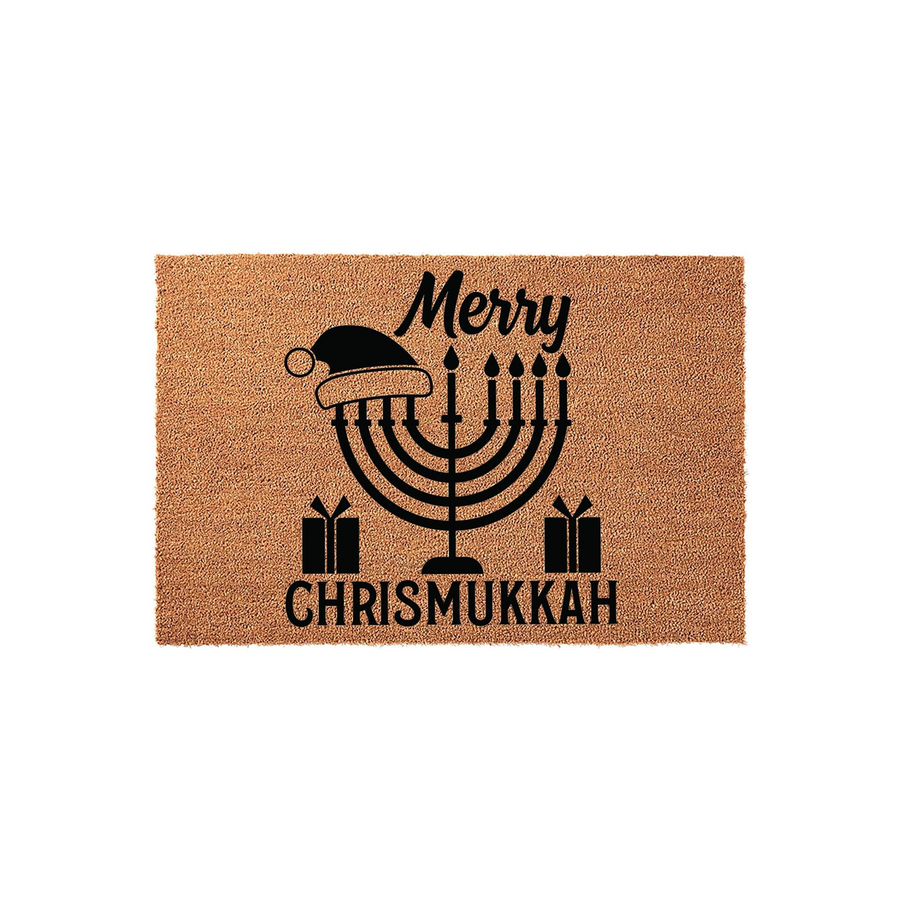 Merry Chrismukkah coir doormat featuring a black graphic of a menorah wearing a Santa hat, flanked by two gift boxes on a natural brown fiber background, perfect for a festive holiday entryway decoration during the winter season.