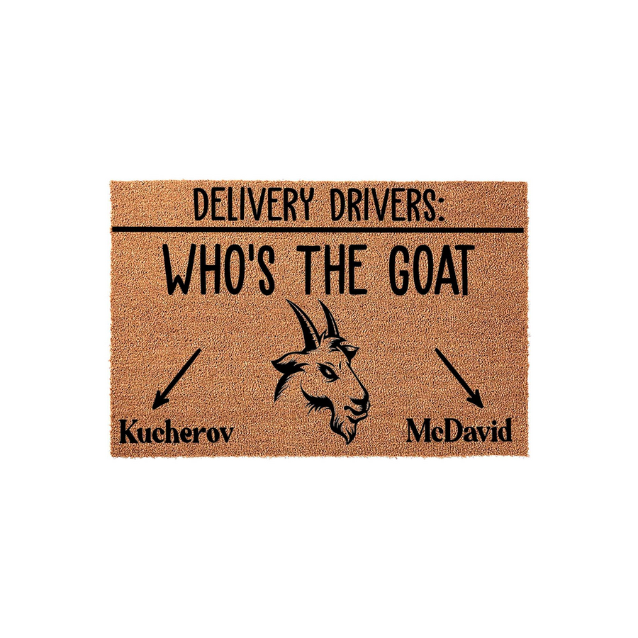 Funny Hockey Fan Doormat featuring a goat illustration and the text Delivery Drivers Who Is The Goat with arrows pointing to the names Kucherov and McDavid, printed on a natural brown coir fiber mat against a clean white