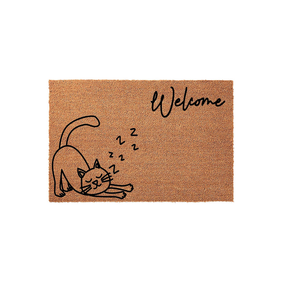 Sleeping Cat Welcome Doormat featuring a natural coir texture with a black line-art illustration of a napping kitten and the word Welcome written in a playful script font, creating a cozy entrance for any cat lover's home decor.