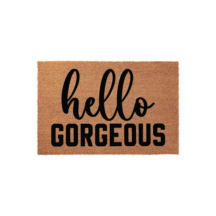 Hello Gorgeous coir doormat featuring a natural brown fiber texture with the words hello in a black script font and GORGEOUS in a bold sans-serif font, creating a welcoming entryway decor piece for your front porch or home