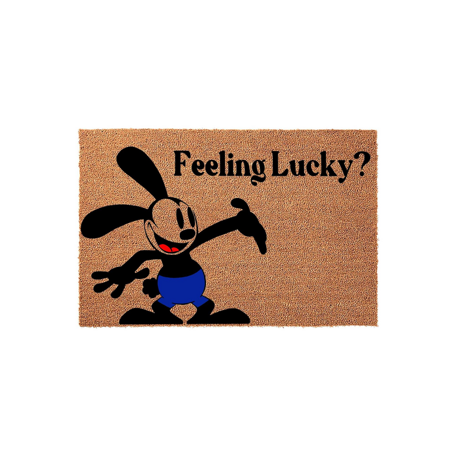 Oswald the Lucky Rabbit coir doormat featuring the classic cartoon character in blue shorts pointing to the text Feeling Lucky? printed in black on the natural brown textured fiber surface against a clean white studio background.