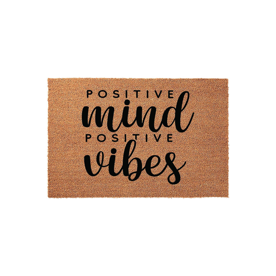 Positive Mind Positive Vibes Coir Doormat featuring a natural brown coconut fiber texture with bold black typography, creating a welcoming and inspirational entryway decor piece for your home or front porch area.