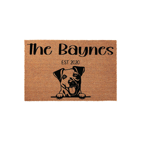 Personalized Jack Russell Terrier doormat featuring a cute dog illustration, custom family name text, and an established year on a natural coir fiber background, perfect for a welcoming front porch entrance for any dog-loving
