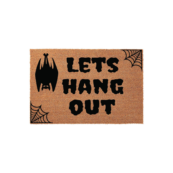 Halloween Bat Welcome Doormat featuring a natural coir texture with black printed text that says Lets Hang Out, accented by a hanging bat illustration and spider web corners for a spooky seasonal entryway decor piece.