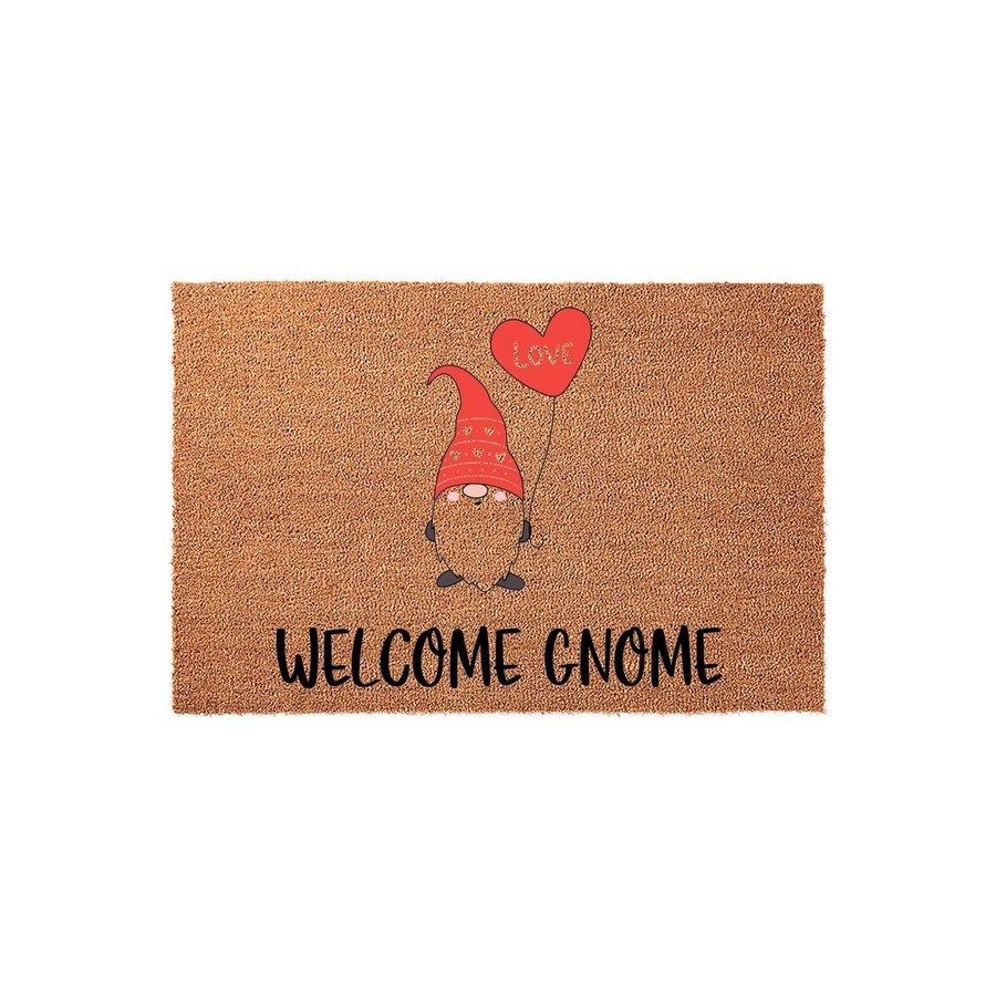 Welcome Gnome Coir Doormat featuring a cute illustrated garden gnome wearing a red hat and holding a red heart balloon that says Love, set against a natural brown textured fiber background for a festive and welcoming front porch