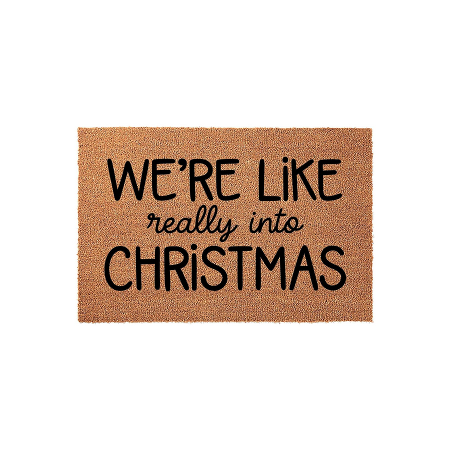 We are really into Christmas coir doormat featuring bold black typography on a natural brown fiber background, making a festive holiday statement for your front porch entrance during the winter season and holiday home decor.
